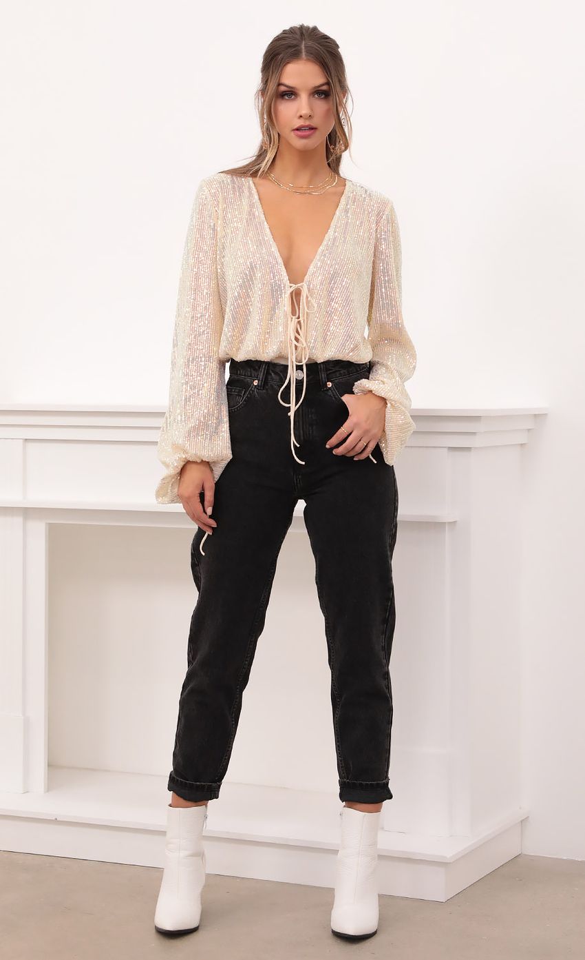Picture Talia Tie Front Bodysuit in Champagne Sequin. Source: https://media-img.lucyinthesky.com/data/Dec20_2/850xAUTO/1V9A0907_2.JPG
