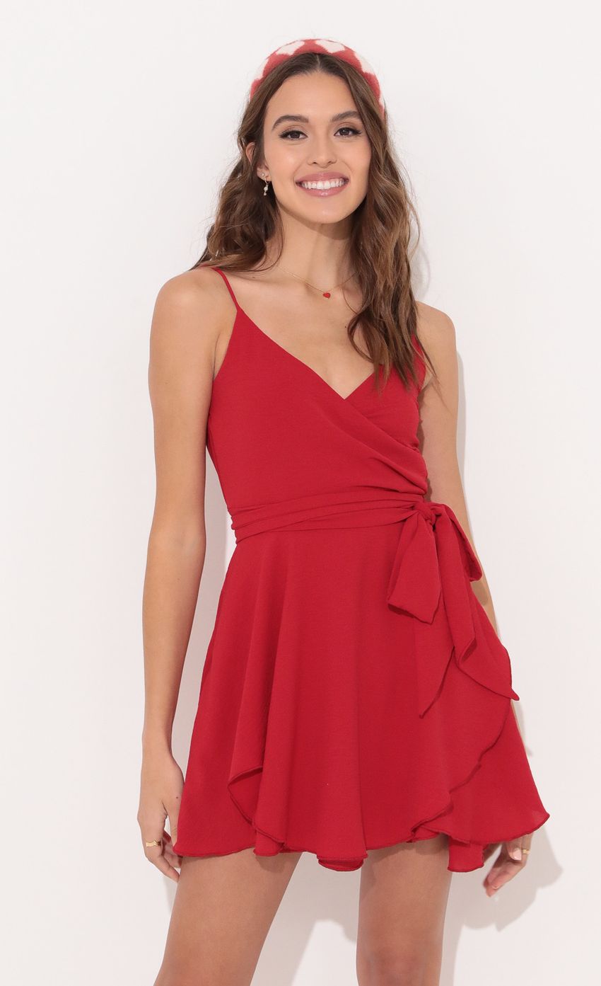 Picture Wrap Skater Dress in Red. Source: https://media-img.lucyinthesky.com/data/Dec21_1/850xAUTO/1V9A1050.JPG