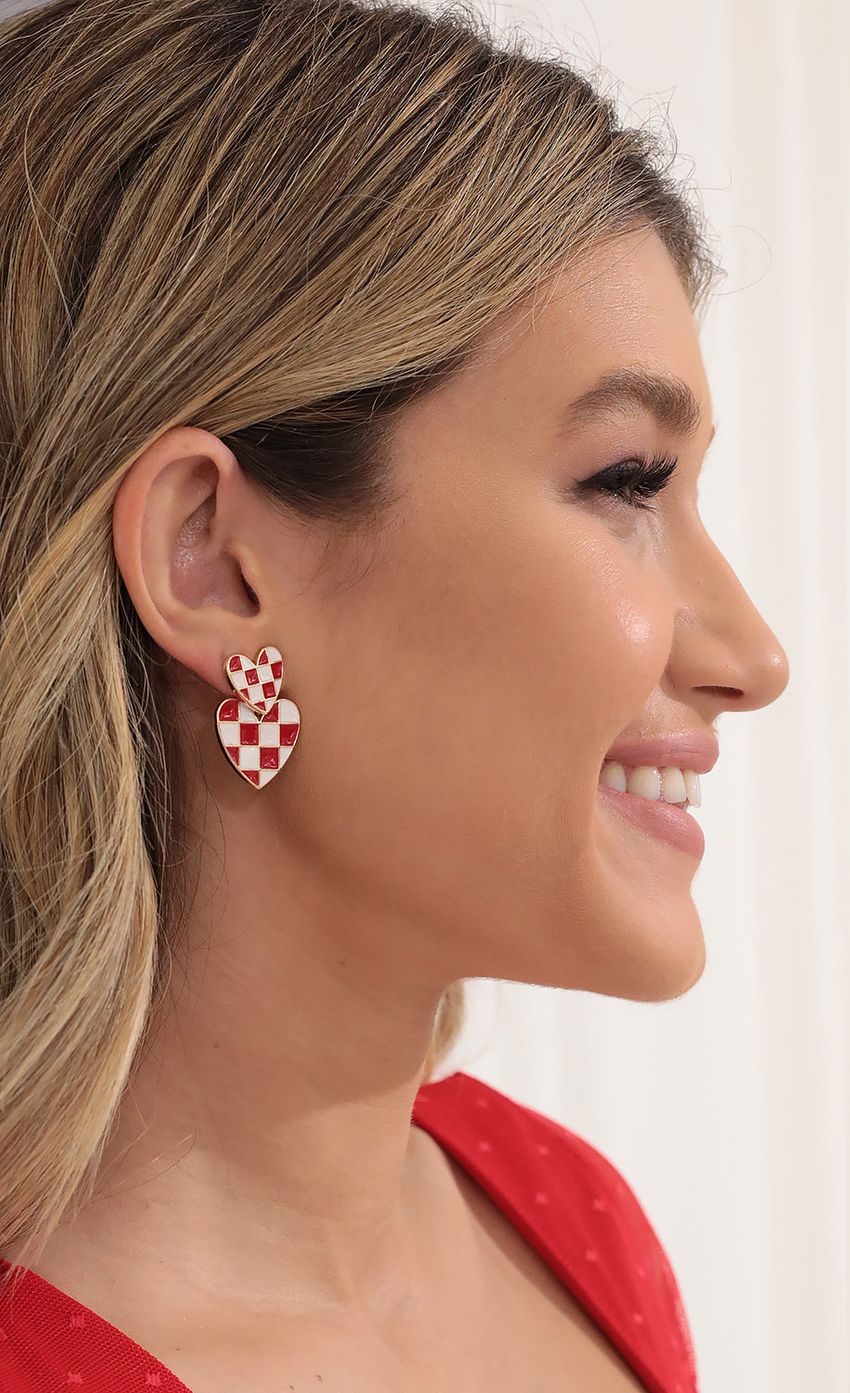 Picture Check On My Heart Earrings in Red. Source: https://media-img.lucyinthesky.com/data/Dec21_1/850xAUTO/1V9A2545.JPG