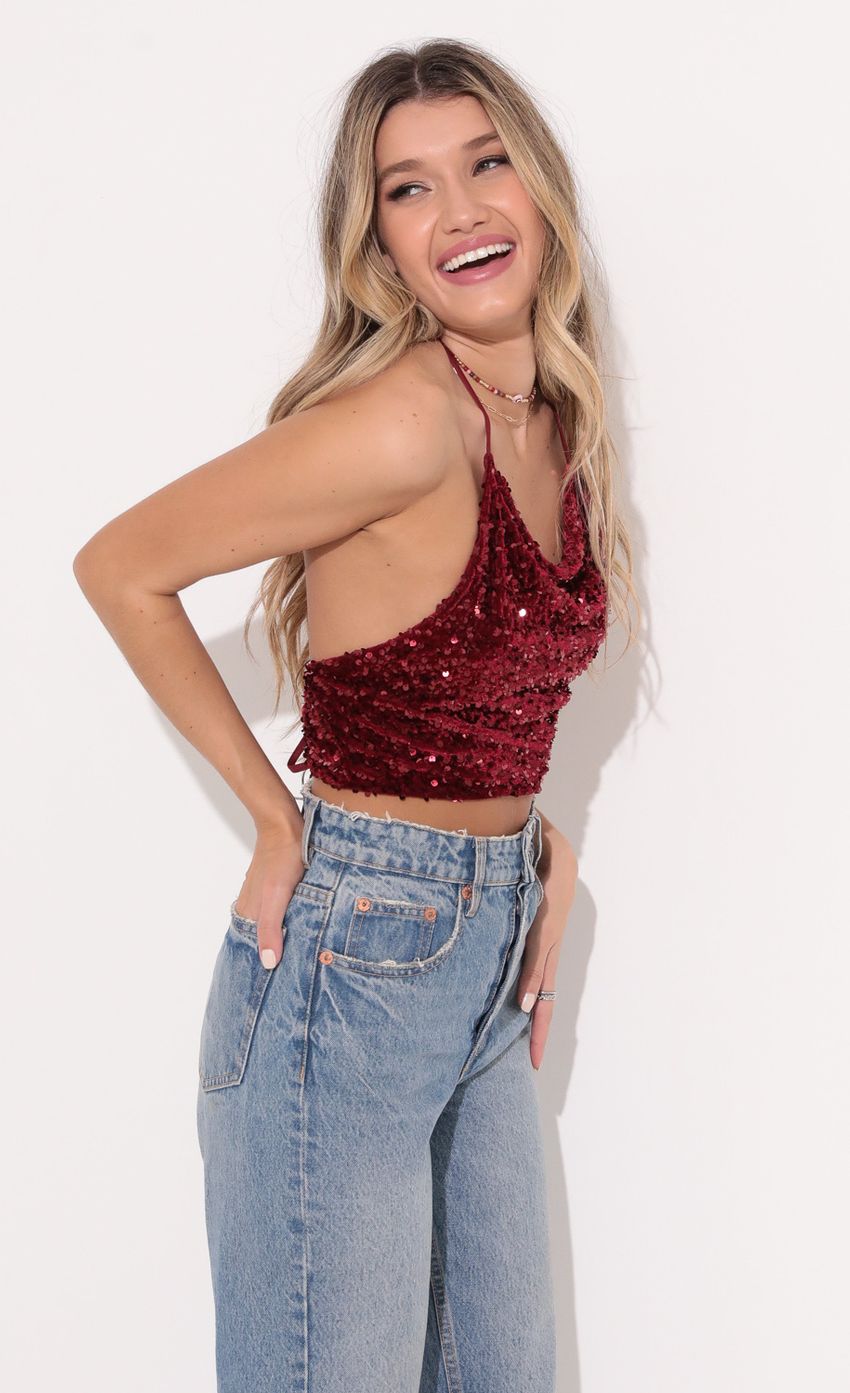 Picture Iridescent Sequin Halter Top in Red. Source: https://media-img.lucyinthesky.com/data/Dec21_1/850xAUTO/1V9A4839.JPG