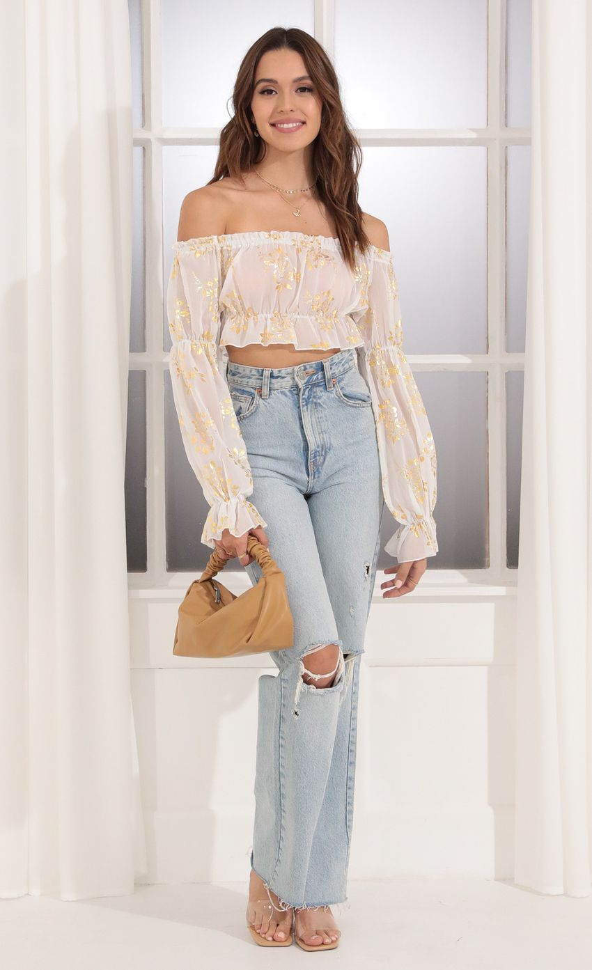 Picture Off Shoulder Top in White and Gold. Source: https://media-img.lucyinthesky.com/data/Dec21_1/850xAUTO/1V9A6598.JPG