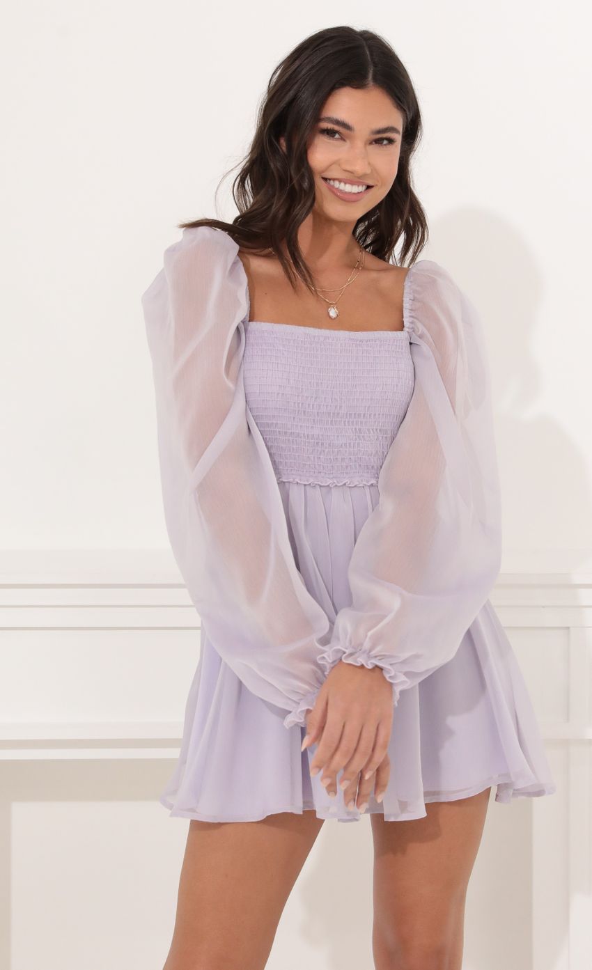 Picture Fit and Flare Dress in Purple. Source: https://media-img.lucyinthesky.com/data/Dec21_2/850xAUTO/1V9A0316.JPG