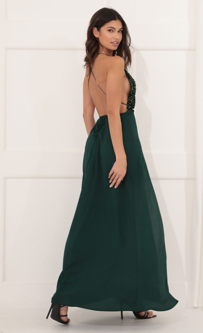 Picture Sequin Maxi Dress in Green. Source: https://media-img.lucyinthesky.com/data/Dec21_2/850xAUTO/1V9A8241.JPG