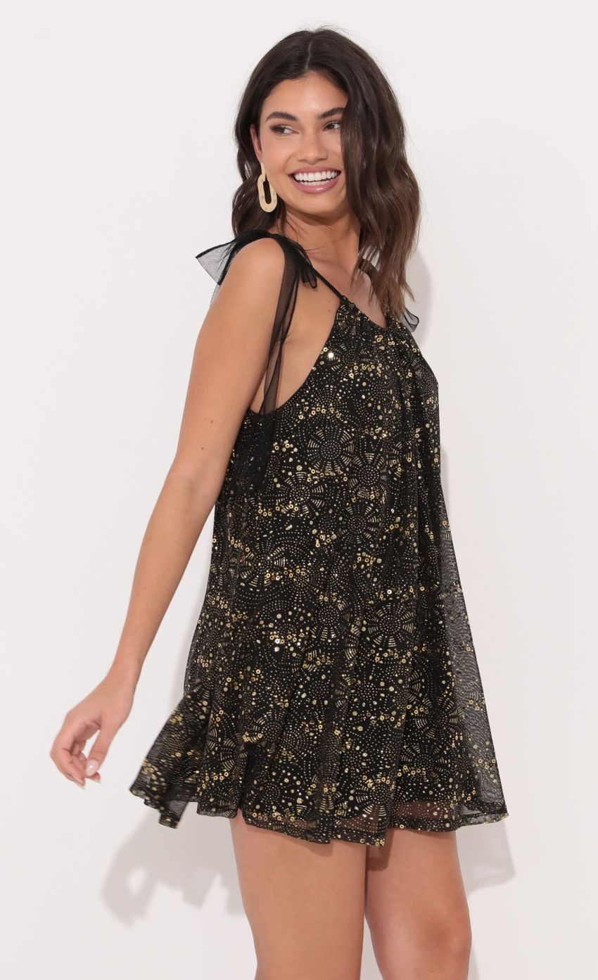 Picture Shoulder Tie Dress in Shimmer Black. Source: https://media-img.lucyinthesky.com/data/Dec21_2/850xAUTO/1V9A9875.JPG