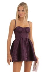 Picture Floral Jacquard Corset Dress in Purple. Source: https://media-img.lucyinthesky.com/data/Dec22/150xAUTO/2126d2d3-b668-4bbb-a062-65d4a0314f07.jpg