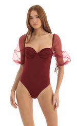 Picture Puff Sleeve Bodysuit in Red. Source: https://media-img.lucyinthesky.com/data/Dec22/150xAUTO/49239004-e33e-4881-be6e-10f063ad96fc.jpg