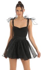 Picture Skater Skirt in Black. Source: https://media-img.lucyinthesky.com/data/Dec22/150xAUTO/653cd1db-ca9a-41bd-bf83-6629b4a1c590.jpg