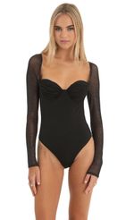 Picture Glitter Mesh Long Sleeve Bodysuit in Black. Source: https://media-img.lucyinthesky.com/data/Dec22/150xAUTO/85ea0321-ac22-4ef3-86f0-9fd9622a5594.jpg
