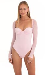 Picture Glitter Mesh Long Sleeve Bodysuit in Pink. Source: https://media-img.lucyinthesky.com/data/Dec22/150xAUTO/91763d6b-51fa-459b-9b2c-1af4fae8641e.jpg