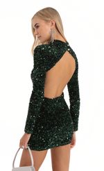 Picture Velvet Iridescent Sequin Open Back Dress in White. Source: https://media-img.lucyinthesky.com/data/Dec22/150xAUTO/f70f5219-147b-4f66-809a-263bbdbfd750.jpg