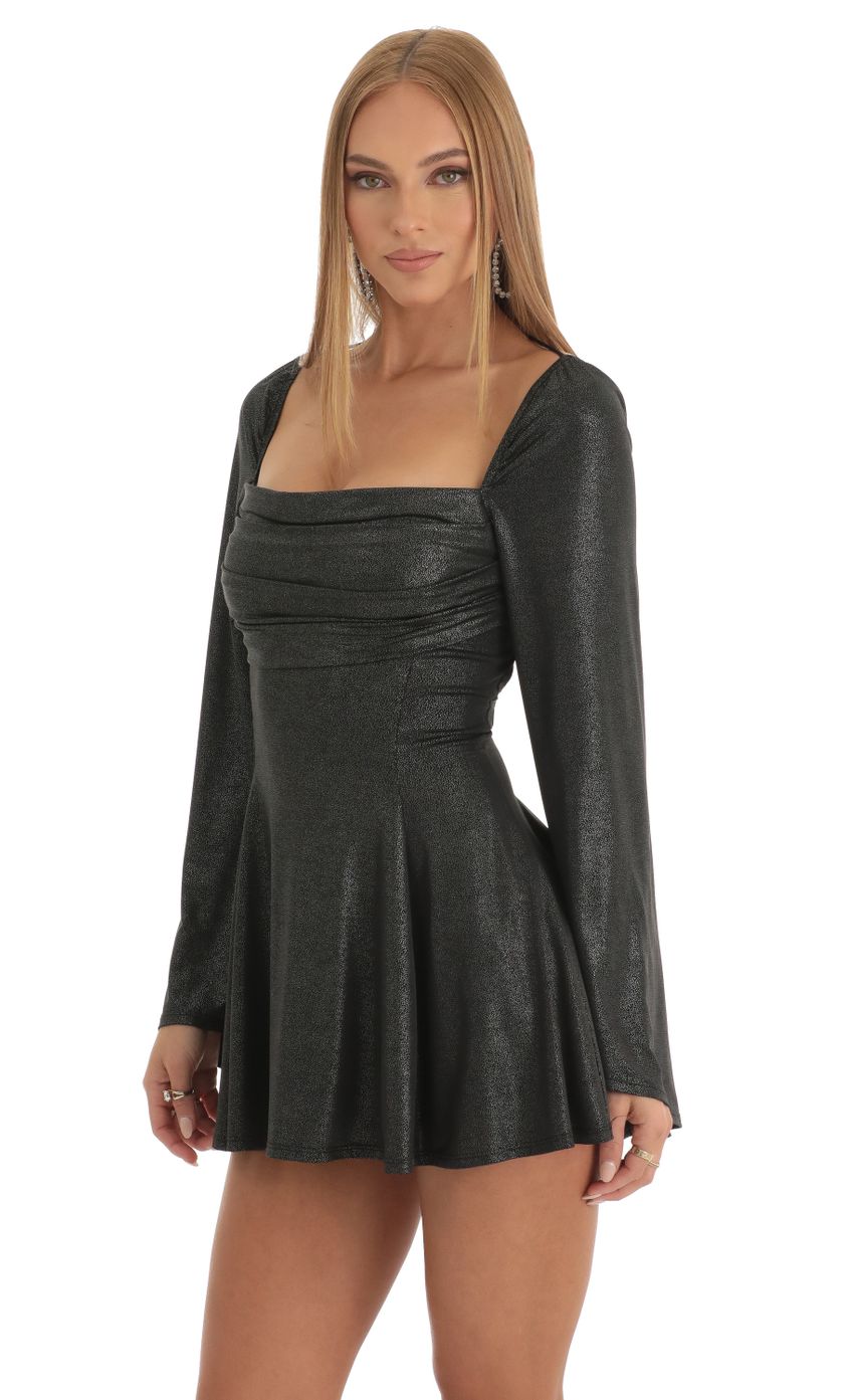 Picture Foil Flare Sleeve Dress in Black. Source: https://media-img.lucyinthesky.com/data/Dec22/850xAUTO/04692371-b5e2-41d4-bc62-584faca1b584.jpg