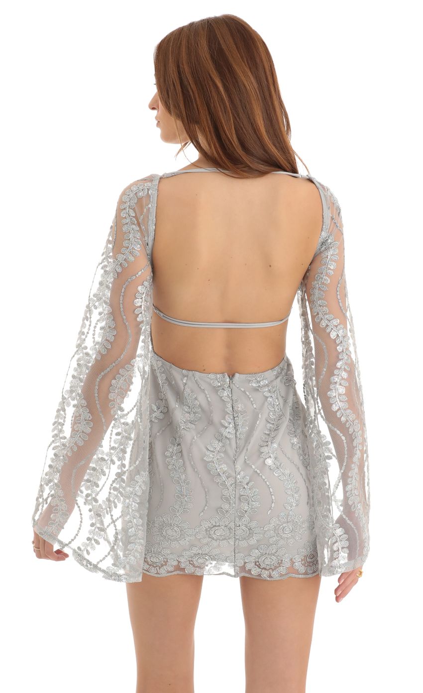 Picture Sequin Flare Sleve Dress in Silver. Source: https://media-img.lucyinthesky.com/data/Dec22/850xAUTO/0e21c84b-8255-42bd-adf6-2ef6212dfab2.jpg