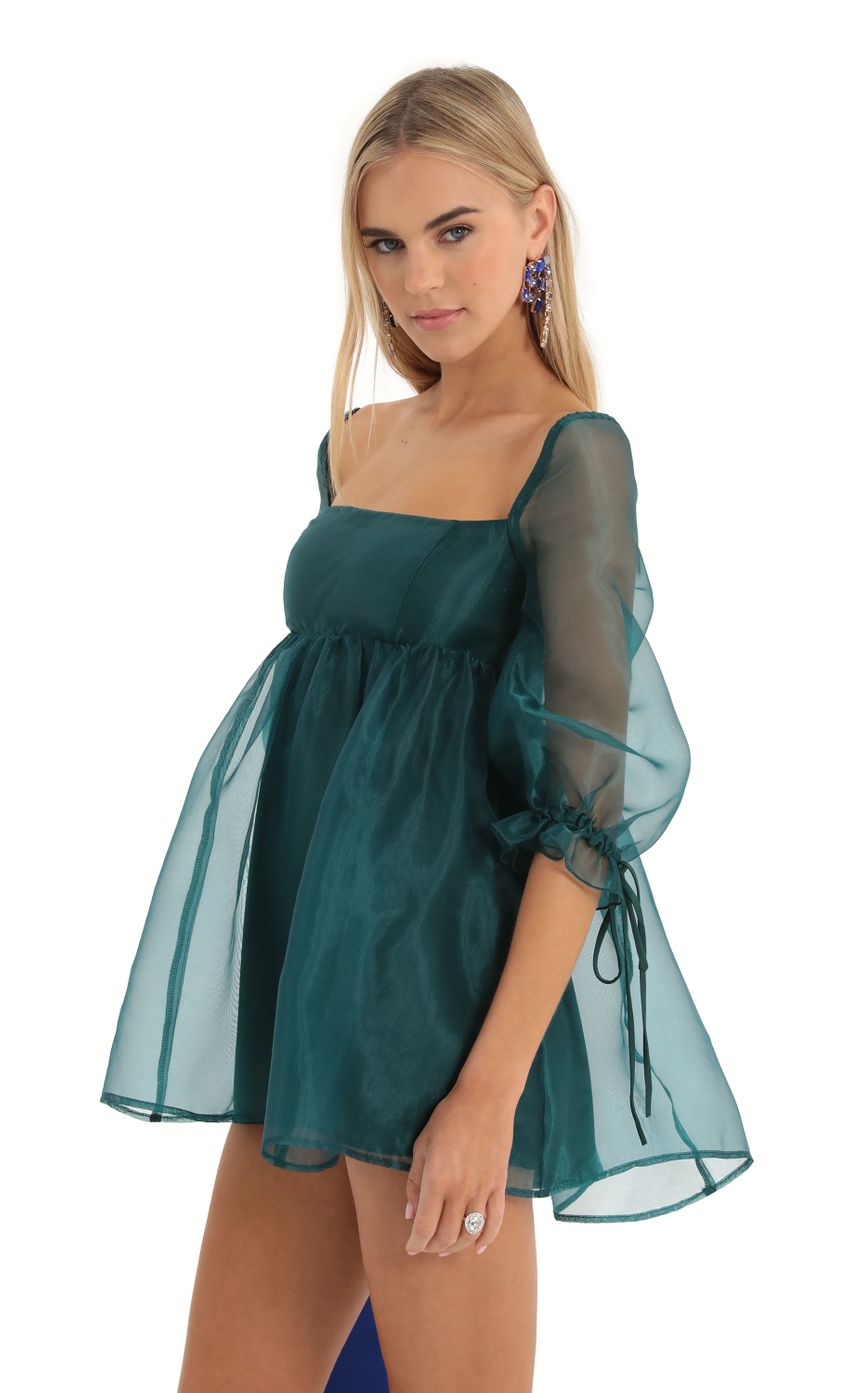 Picture Puff Sleeve Baby Doll Dress in Green. Source: https://media-img.lucyinthesky.com/data/Dec22/850xAUTO/128aee38-cf6a-478b-ab94-bb93cdac1c16.jpg