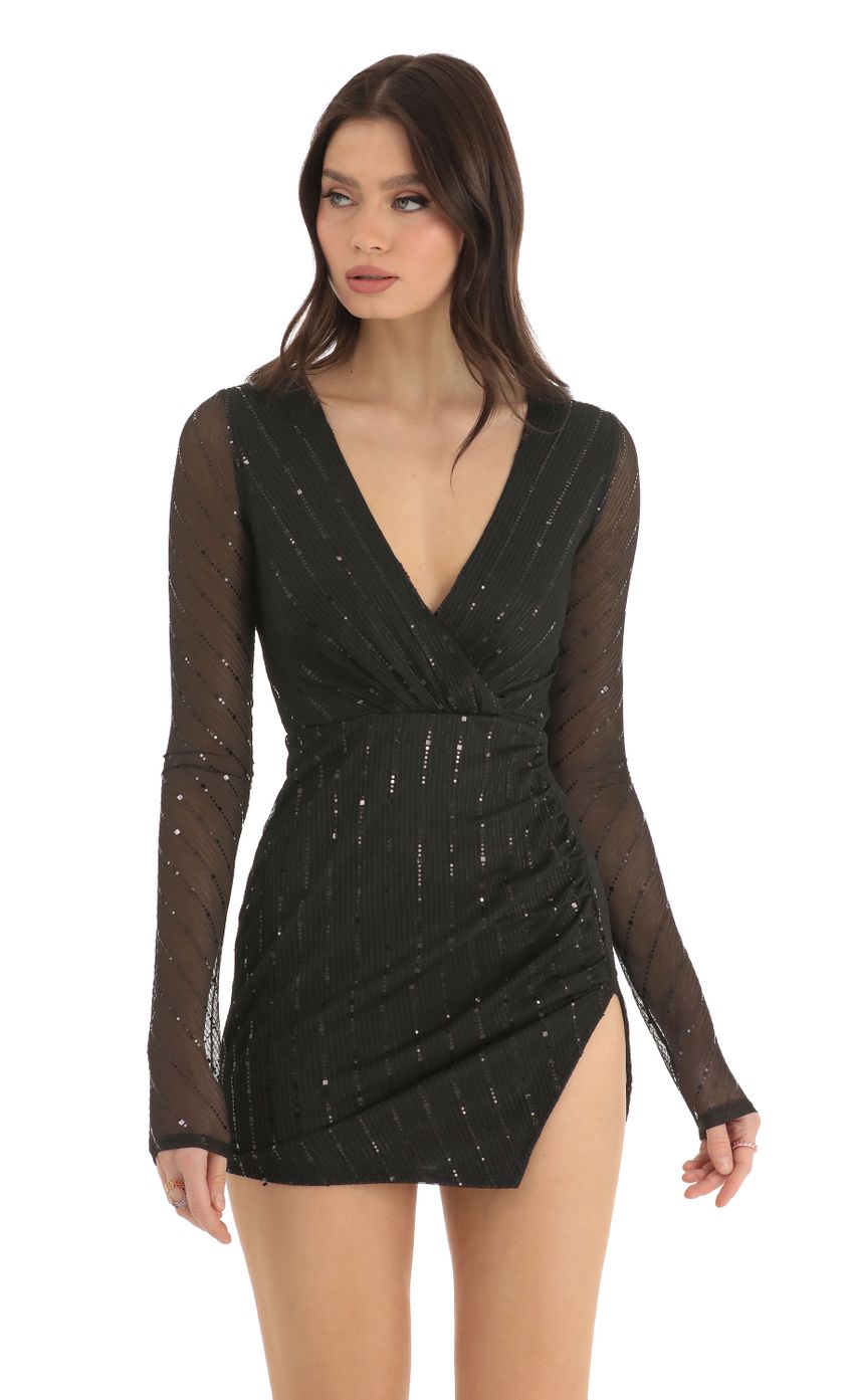 Picture Striped Sequin Long Sleeve Dress in Black. Source: https://media-img.lucyinthesky.com/data/Dec22/850xAUTO/15d54b05-37f1-4637-b7a1-d21e85573388.jpg