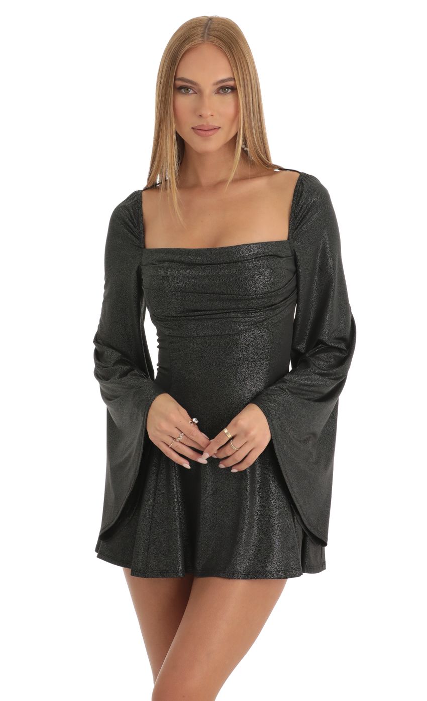 Picture Foil Flare Sleeve Dress in Black. Source: https://media-img.lucyinthesky.com/data/Dec22/850xAUTO/22bf1a2d-cf01-4153-a07a-ae0e616438fa.jpg