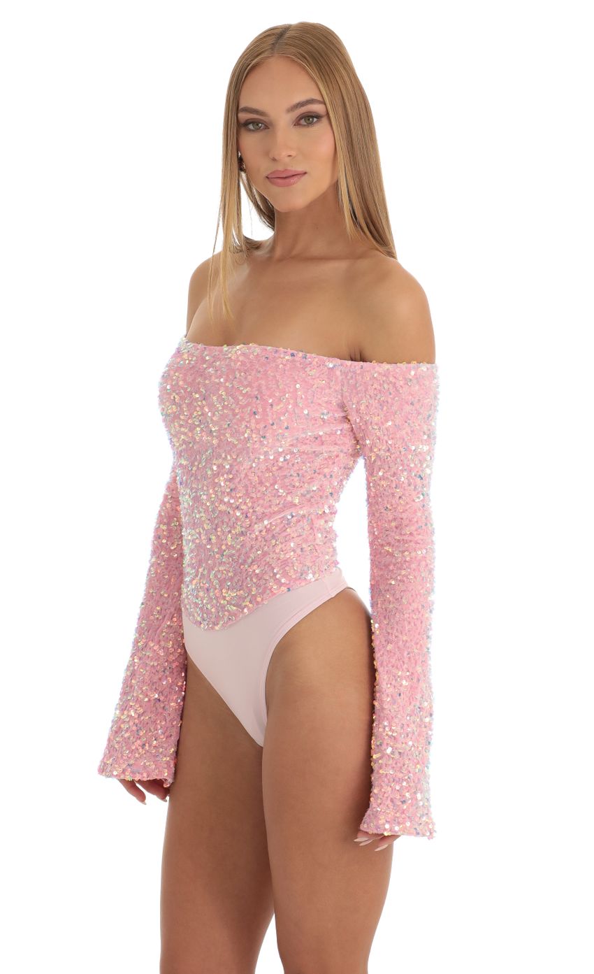 Picture Velvet Sequin Bodysuit in Pink. Source: https://media-img.lucyinthesky.com/data/Dec22/850xAUTO/22c57ac9-30cf-4a89-8c1e-b462cbc89839.jpg