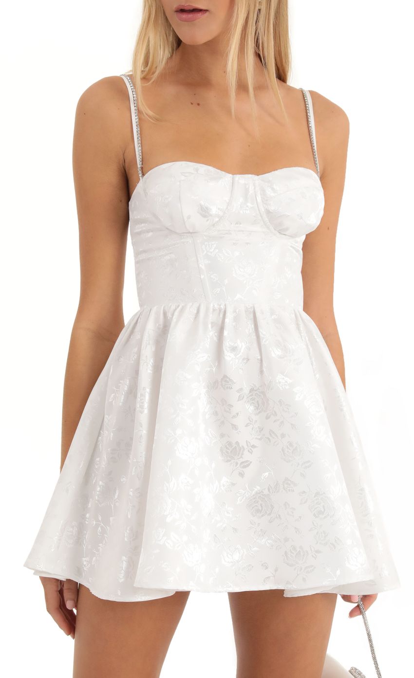 Picture Floral Jacquard Corset Dress in White. Source: https://media-img.lucyinthesky.com/data/Dec22/850xAUTO/27881f61-ba62-4e7f-9f0e-95f331183813.jpg