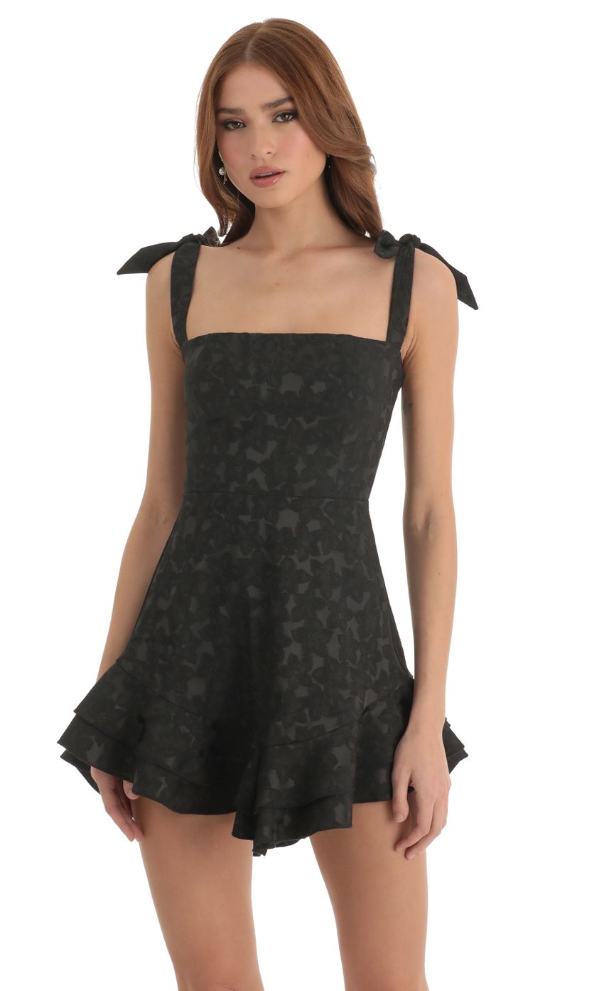 Picture Floral Jacquard Ruffle Dress in Black. Source: https://media-img.lucyinthesky.com/data/Dec22/850xAUTO/2ca16910-28d4-4c2e-9a24-4f007c949f5e.jpg