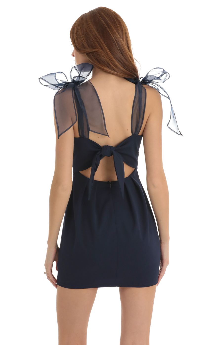 Picture Shoulder Ties Pocket Dress in Navy. Source: https://media-img.lucyinthesky.com/data/Dec22/850xAUTO/2d1fe9a1-e535-4cf9-a9f2-a8034d415901.jpg