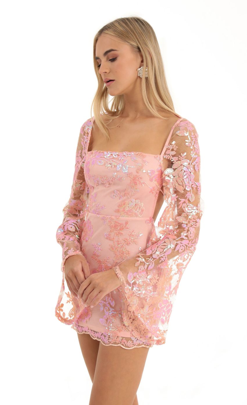 Picture Lace Sequin Flare Sleve Dress in Peach. Source: https://media-img.lucyinthesky.com/data/Dec22/850xAUTO/2de8010a-23e4-4342-8900-b24946ee0d61.jpg