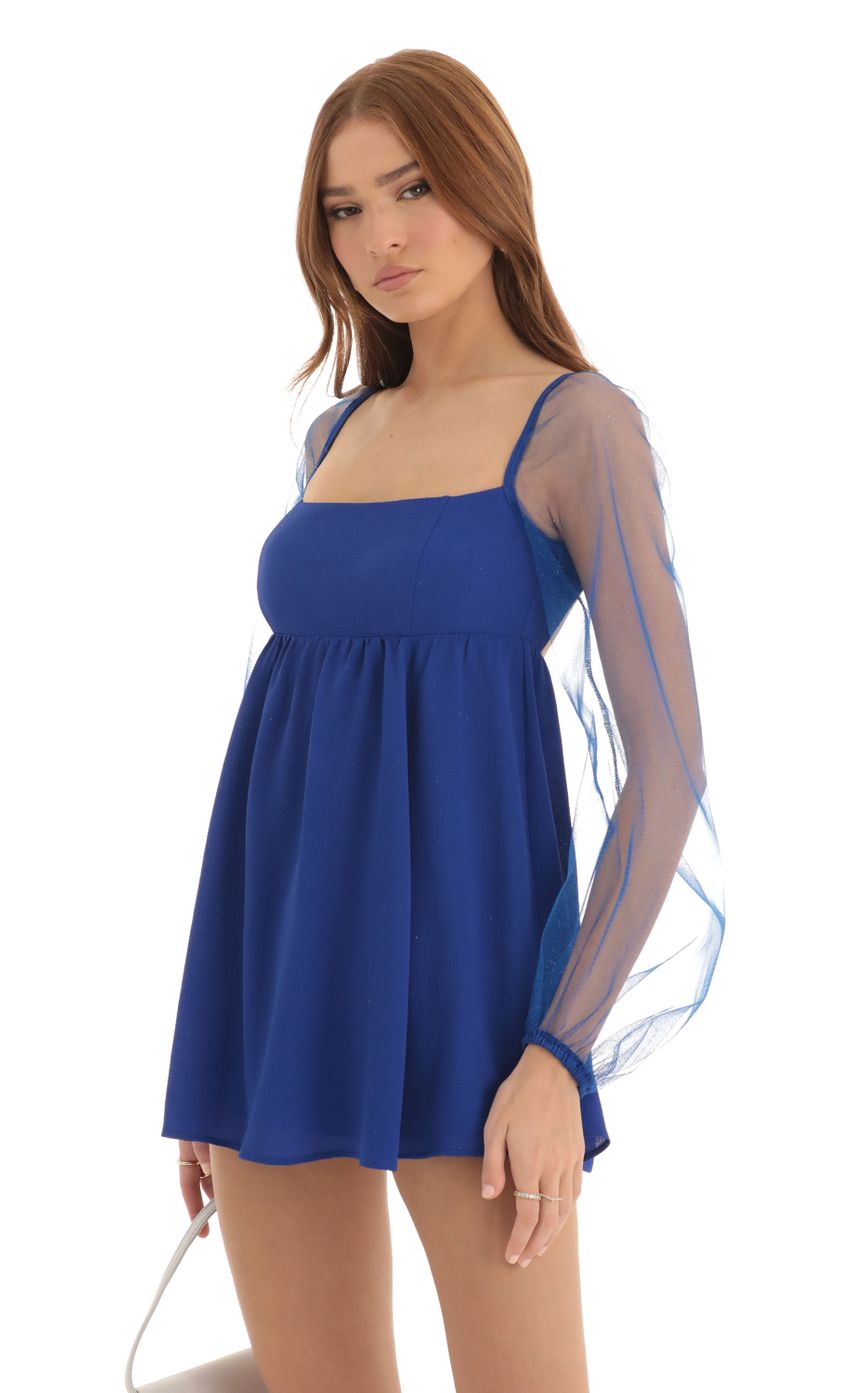 Picture Birdie Glitter Long Sleeve Baby Doll Dress in Blue. Source: https://media-img.lucyinthesky.com/data/Dec22/850xAUTO/36a21fde-cb1e-4127-85dd-61d11ae73fb9.jpg