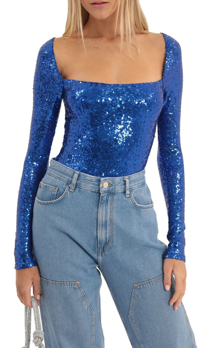 Picture Sequin Long Sleeve Bodysuit in Blue. Source: https://media-img.lucyinthesky.com/data/Dec22/850xAUTO/416f3a48-41b9-4a52-a761-7edca188e272.jpg