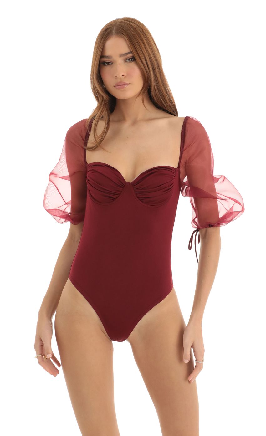 Picture Puff Sleeve Bodysuit in Red. Source: https://media-img.lucyinthesky.com/data/Dec22/850xAUTO/49239004-e33e-4881-be6e-10f063ad96fc.jpg