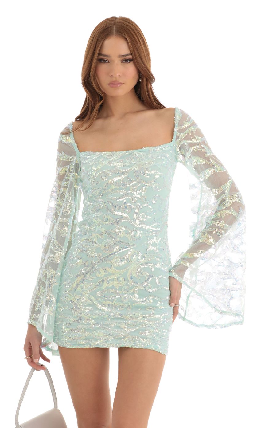 Picture Flare Sleeve Sequin Dress in Turquoise. Source: https://media-img.lucyinthesky.com/data/Dec22/850xAUTO/493412d9-8f6c-443c-99ea-06fc624ba6ac.jpg