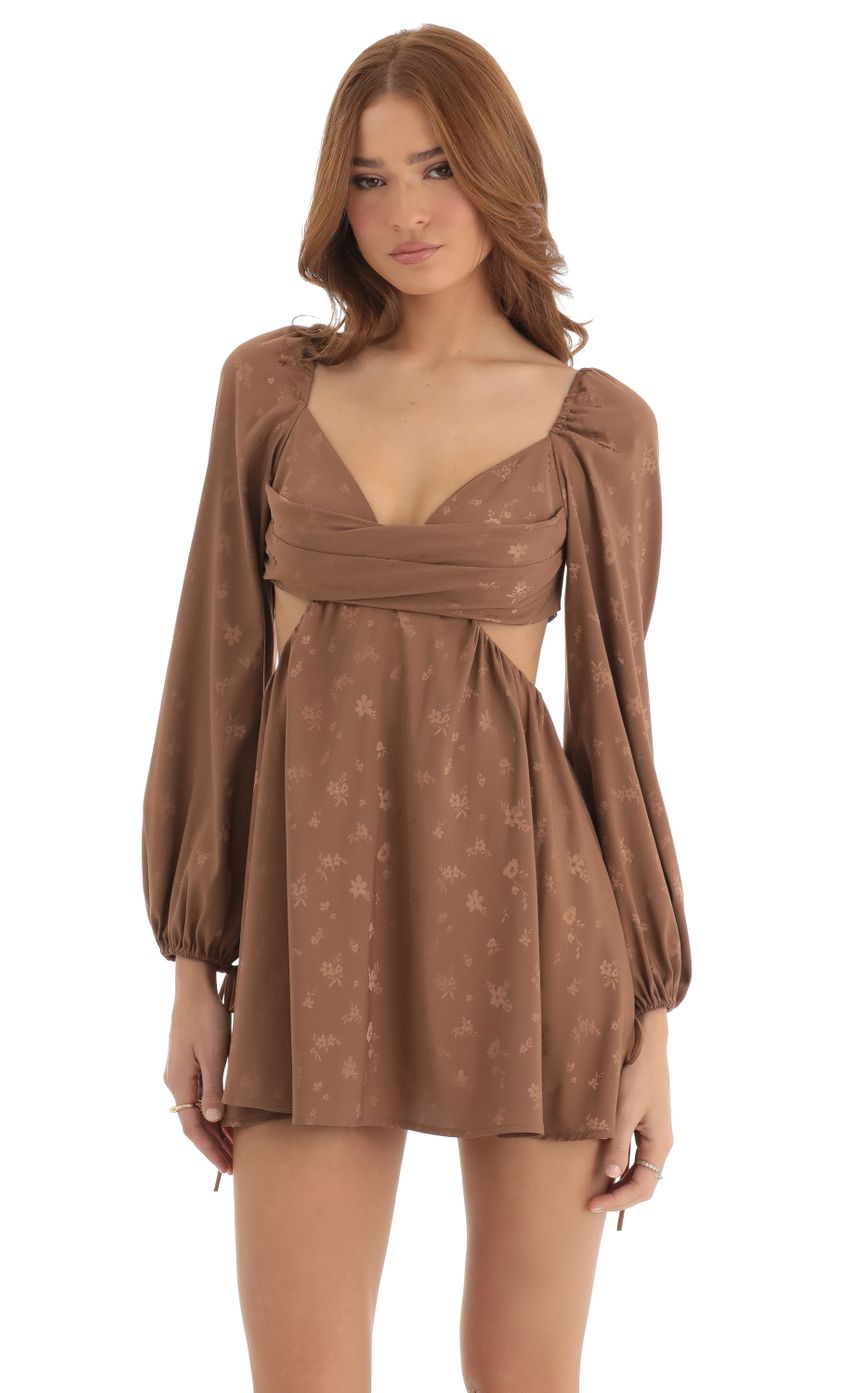 Picture Floral Long Sleeve Fit and Flare Dress in Brown. Source: https://media-img.lucyinthesky.com/data/Dec22/850xAUTO/49760022-74cd-4ab6-b176-729c5e23fee1.jpg