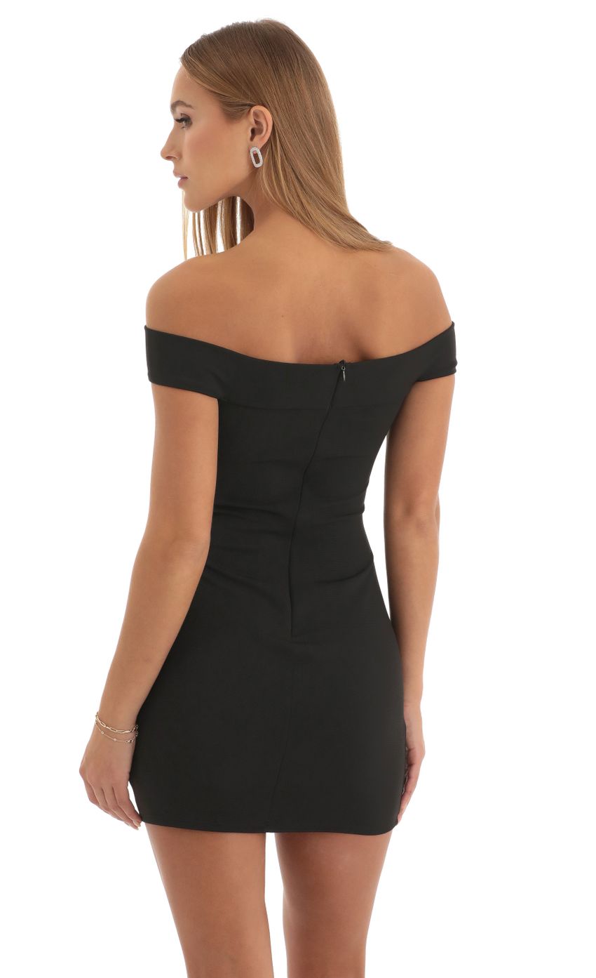 Picture Cutout Bodycon Dress in Black. Source: https://media-img.lucyinthesky.com/data/Dec22/850xAUTO/5b42e76c-9f1c-4ddb-9be2-0b46f8f48f29.jpg