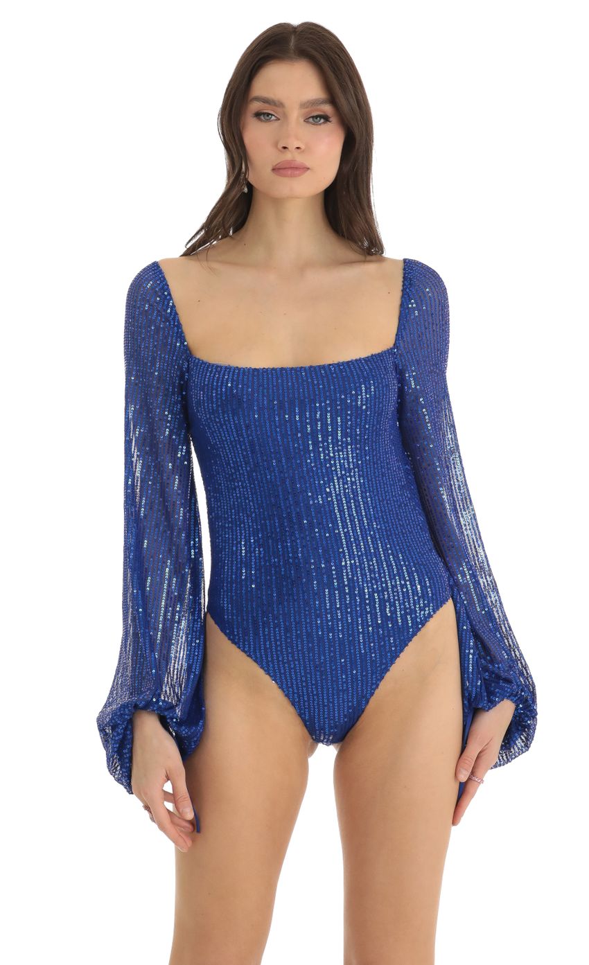 Picture Sequin Long Sleeve Bodysuit in Blue. Source: https://media-img.lucyinthesky.com/data/Dec22/850xAUTO/5ffdd0b1-9024-4352-9441-9a0b3fd3362b.jpg