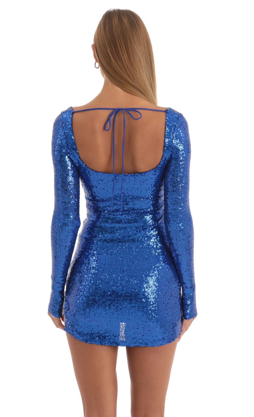 Picture Sequin Long Sleeve Dress in Blue. Source: https://media-img.lucyinthesky.com/data/Dec22/850xAUTO/603ef7b7-9b64-4e47-8fba-2db9c6be058c.jpg