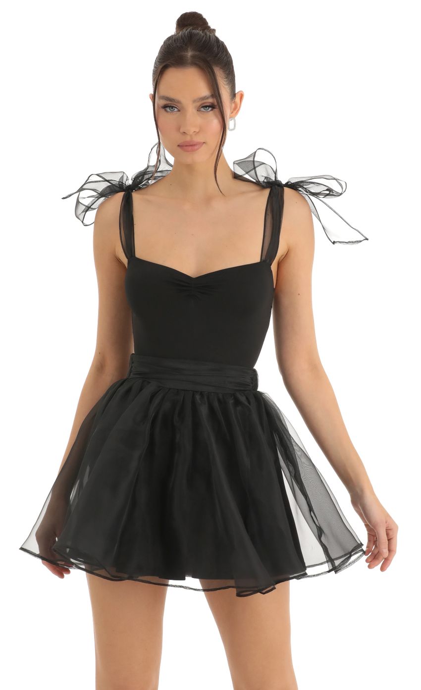 Picture Skater Skirt in Black. Source: https://media-img.lucyinthesky.com/data/Dec22/850xAUTO/653cd1db-ca9a-41bd-bf83-6629b4a1c590.jpg