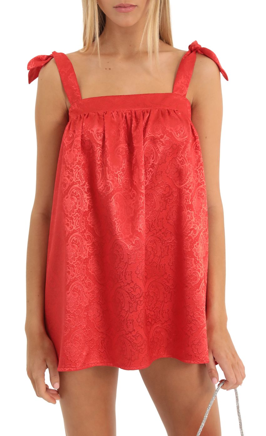 Picture Jacquard Shift Dress in Red. Source: https://media-img.lucyinthesky.com/data/Dec22/850xAUTO/6e571bd8-0828-4496-8c99-5ea1e6470063.jpg