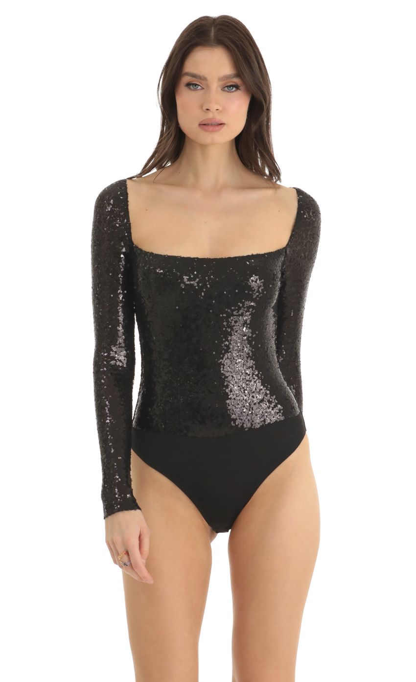 Picture Sequin Long Sleeve Bodysuit in Black. Source: https://media-img.lucyinthesky.com/data/Dec22/850xAUTO/7e489bc6-ecf6-4461-a67c-ac6dd1ae6b50.jpg