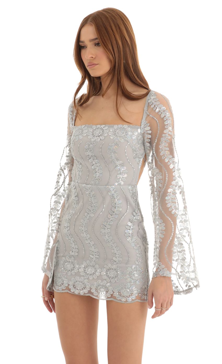 Picture Sequin Flare Sleve Dress in Silver. Source: https://media-img.lucyinthesky.com/data/Dec22/850xAUTO/7fb38556-23d2-452c-a8d0-4a2d044d7709.jpg