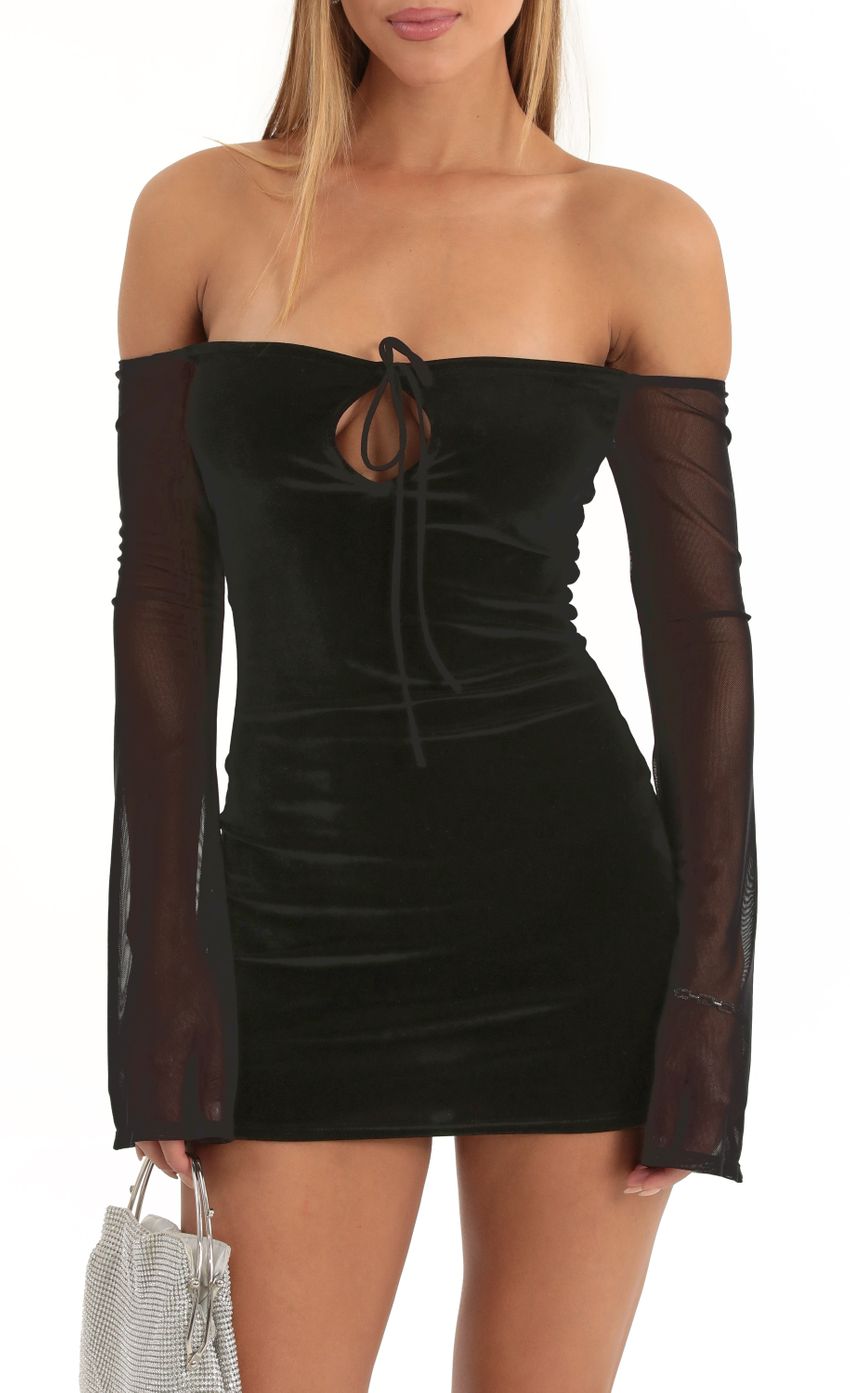 Picture Velvet Off The Shoulder Dress in Black. Source: https://media-img.lucyinthesky.com/data/Dec22/850xAUTO/8739449c-ceb9-4f4c-b87d-65d93092b1b4.jpg