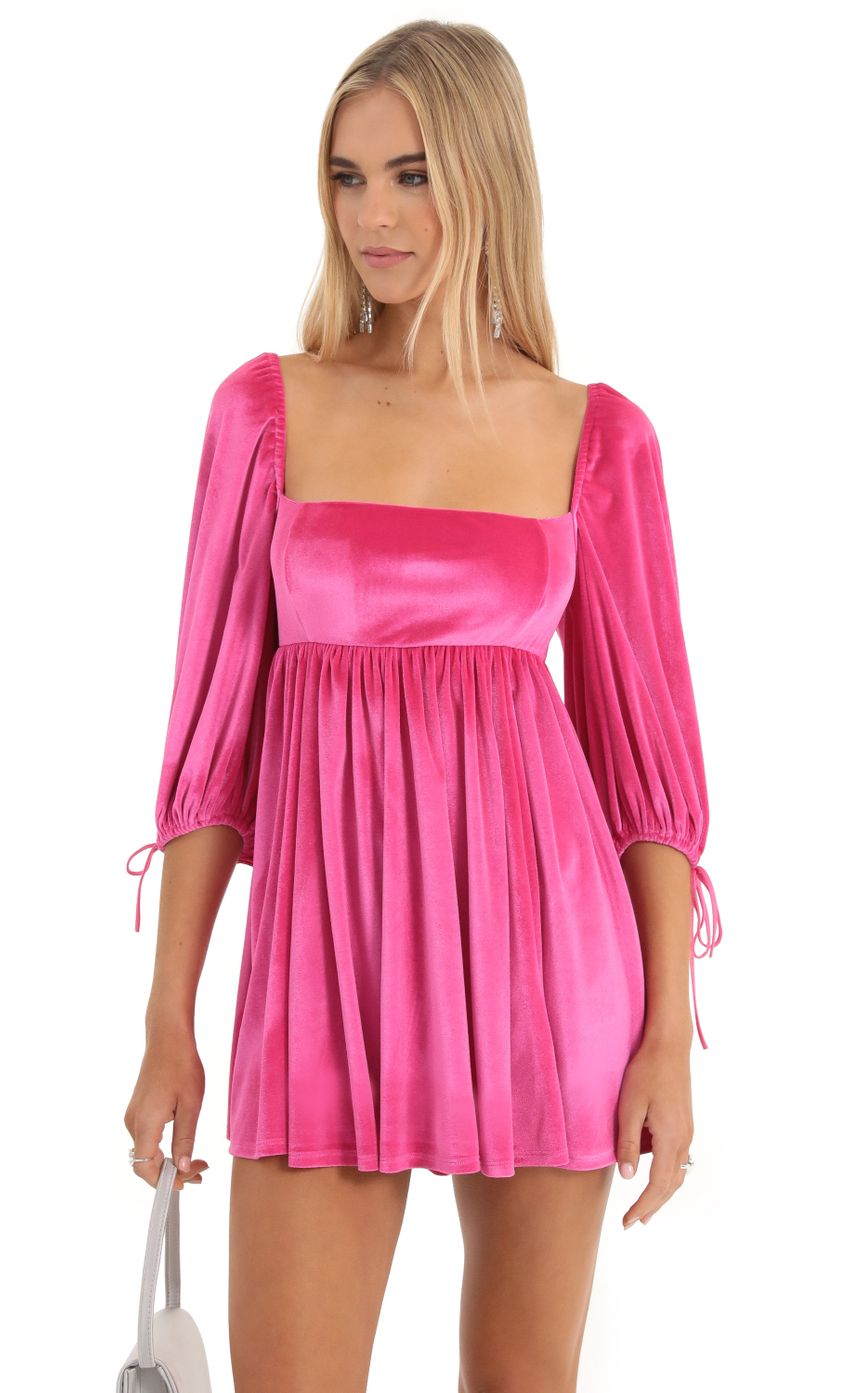 Picture Velvet Baby Doll Dress in Hot Pink. Source: https://media-img.lucyinthesky.com/data/Dec22/850xAUTO/8c461dc5-926c-4a91-9078-3eba64dd465f.jpg