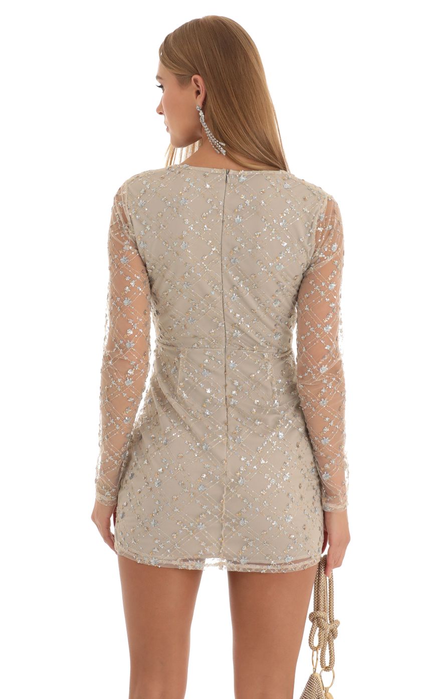 Picture Long Sleeve Dress in Nude Sequin. Source: https://media-img.lucyinthesky.com/data/Dec22/850xAUTO/914bfbdc-4f1a-48c2-a09b-21a1bf02fb62.jpg