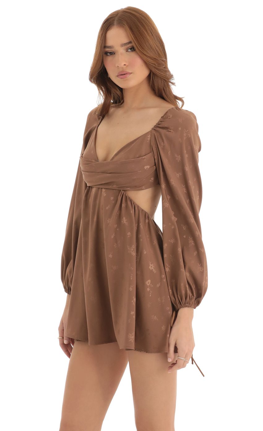 Picture Floral Long Sleeve Fit and Flare Dress in Brown. Source: https://media-img.lucyinthesky.com/data/Dec22/850xAUTO/94534803-d9d8-4534-83d1-962da5a56d15.jpg