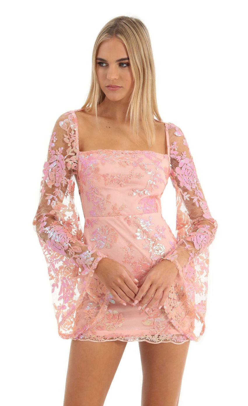 Picture Lace Sequin Flare Sleve Dress in Peach. Source: https://media-img.lucyinthesky.com/data/Dec22/850xAUTO/9933b0cf-6235-44a5-ad41-e1b3d25bd748.jpg