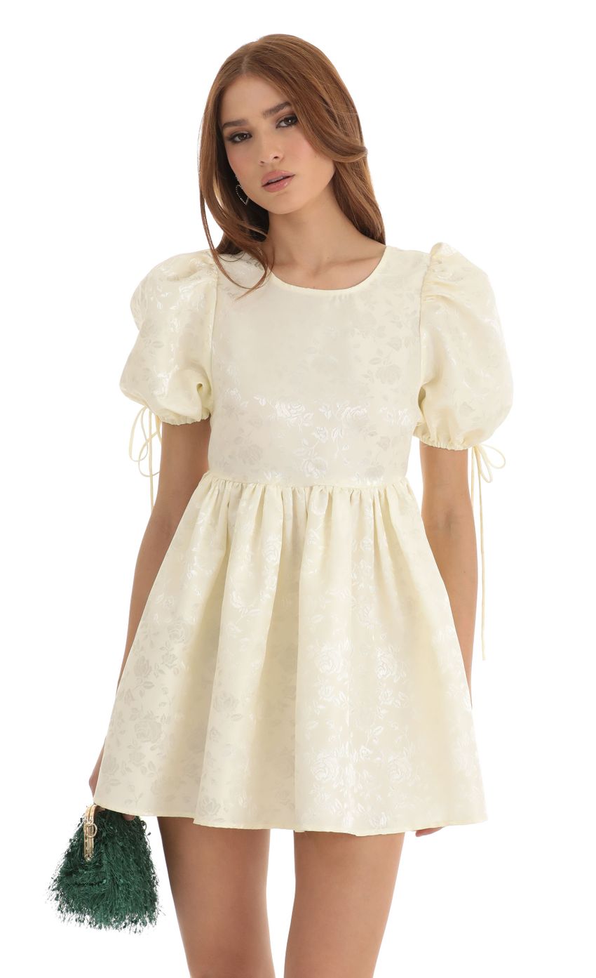 Picture Floral Jacquard Baby Doll Dress in Cream. Source: https://media-img.lucyinthesky.com/data/Dec22/850xAUTO/9c3fd1ce-218e-48c4-8d80-10f71215d28f.jpg