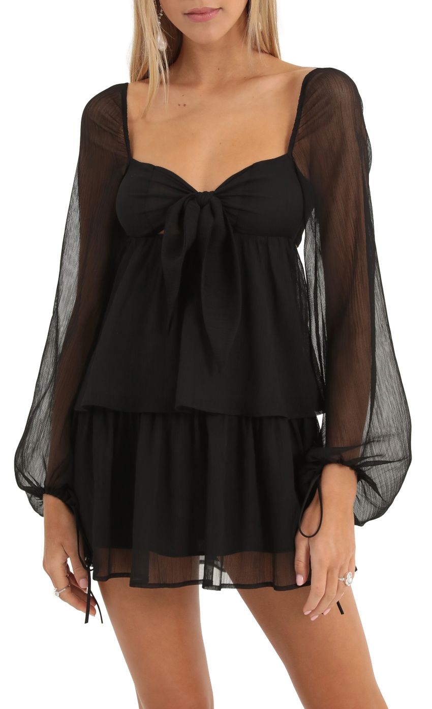 Picture Chiffon Ruffle Dress in Black. Source: https://media-img.lucyinthesky.com/data/Dec22/850xAUTO/a39e4f5b-8442-485b-8688-a04311de0357.jpg