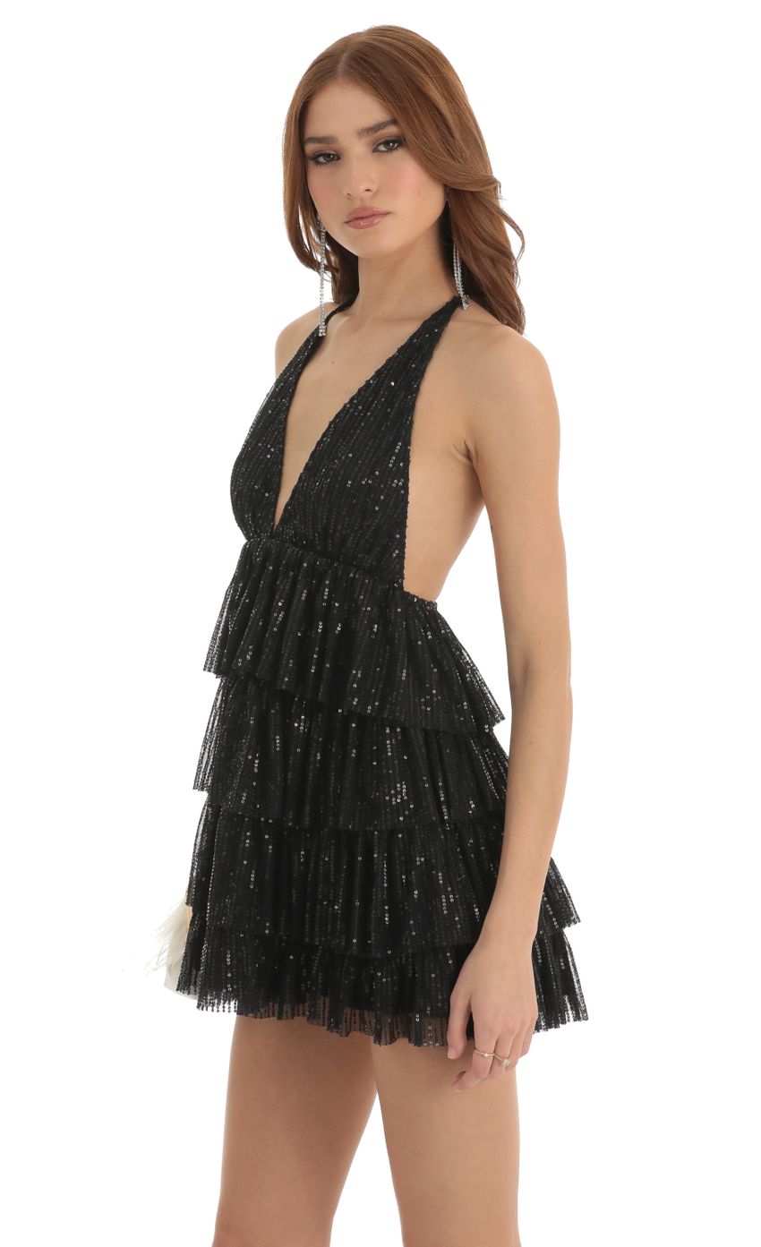 Picture Sequin Ruffle Dress in Black. Source: https://media-img.lucyinthesky.com/data/Dec22/850xAUTO/aae965e6-10fc-4bed-853e-84992b431001.jpg