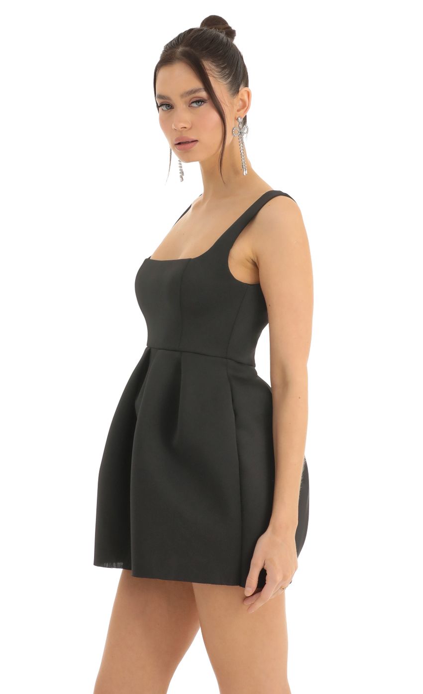Picture A-Line Dress in Black. Source: https://media-img.lucyinthesky.com/data/Dec22/850xAUTO/ae77d212-aa56-467a-a7ce-caed779a8779.jpg
