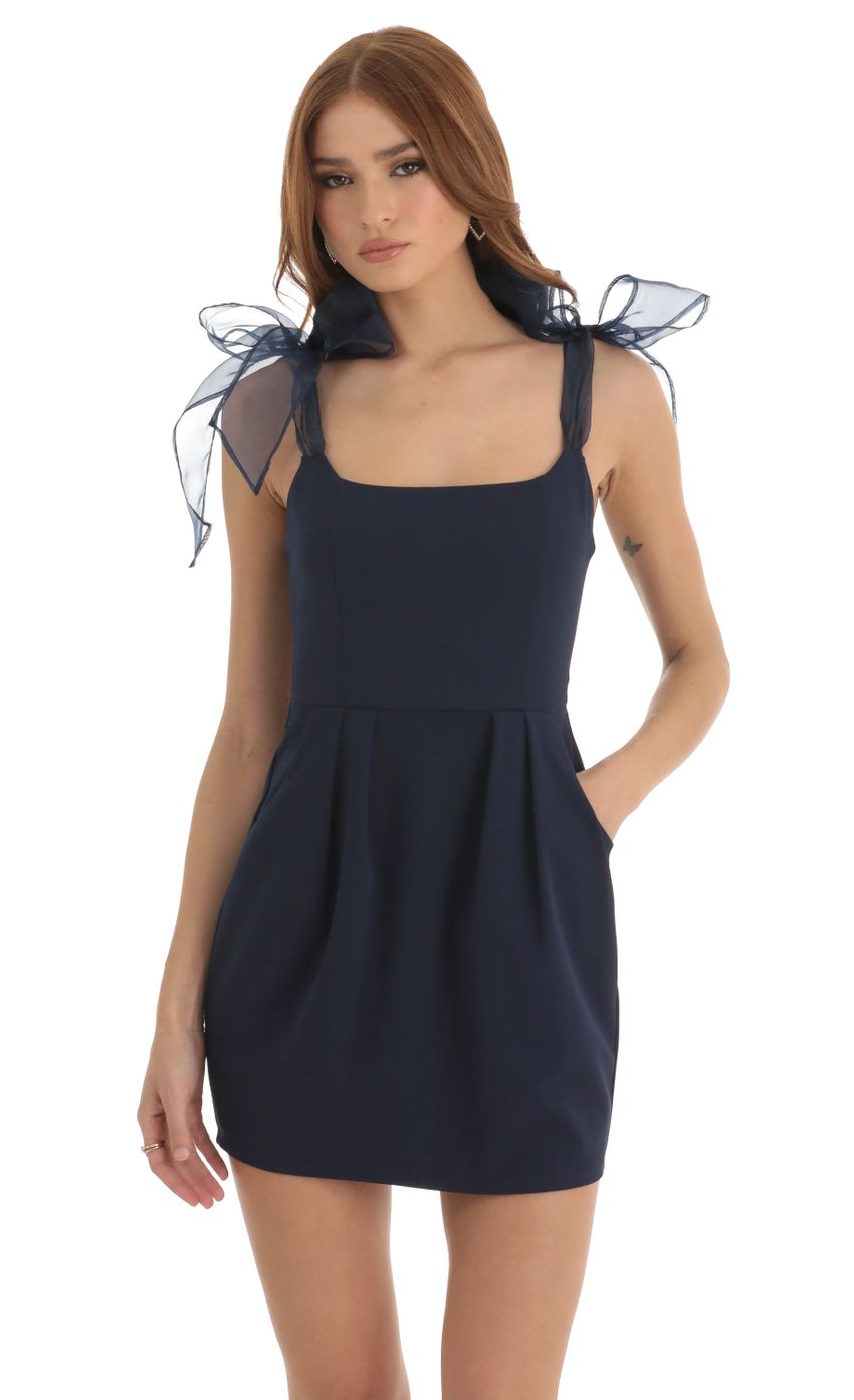 Picture Shoulder Ties Pocket Dress in Navy. Source: https://media-img.lucyinthesky.com/data/Dec22/850xAUTO/b05c6736-37f6-48a1-b93e-6a8c11197ef0.jpg