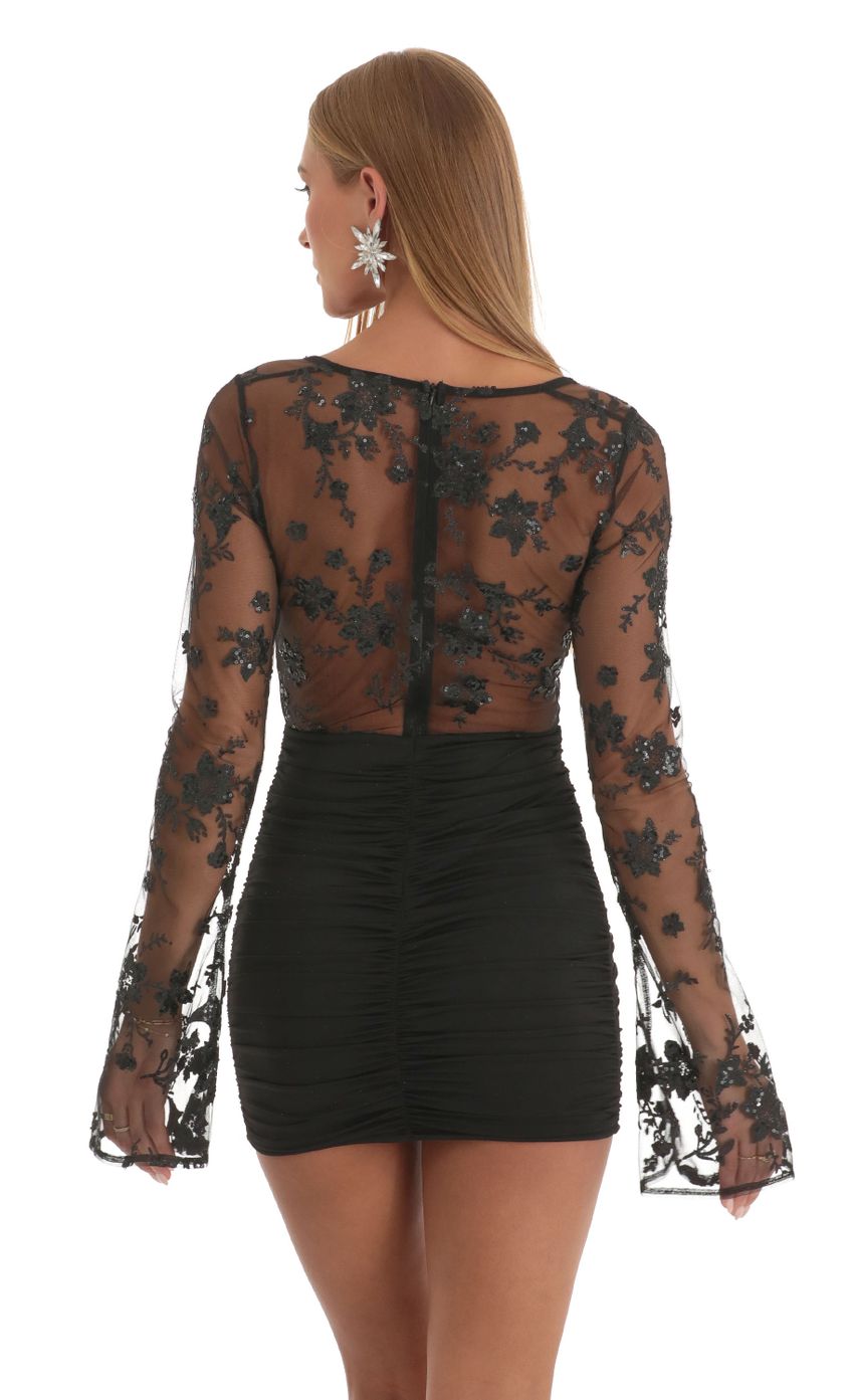 Picture Sequin Long Sleeve Corset Dress in Black. Source: https://media-img.lucyinthesky.com/data/Dec22/850xAUTO/b37244dc-1b68-458c-b3b8-58d2eef8a2f4.jpg