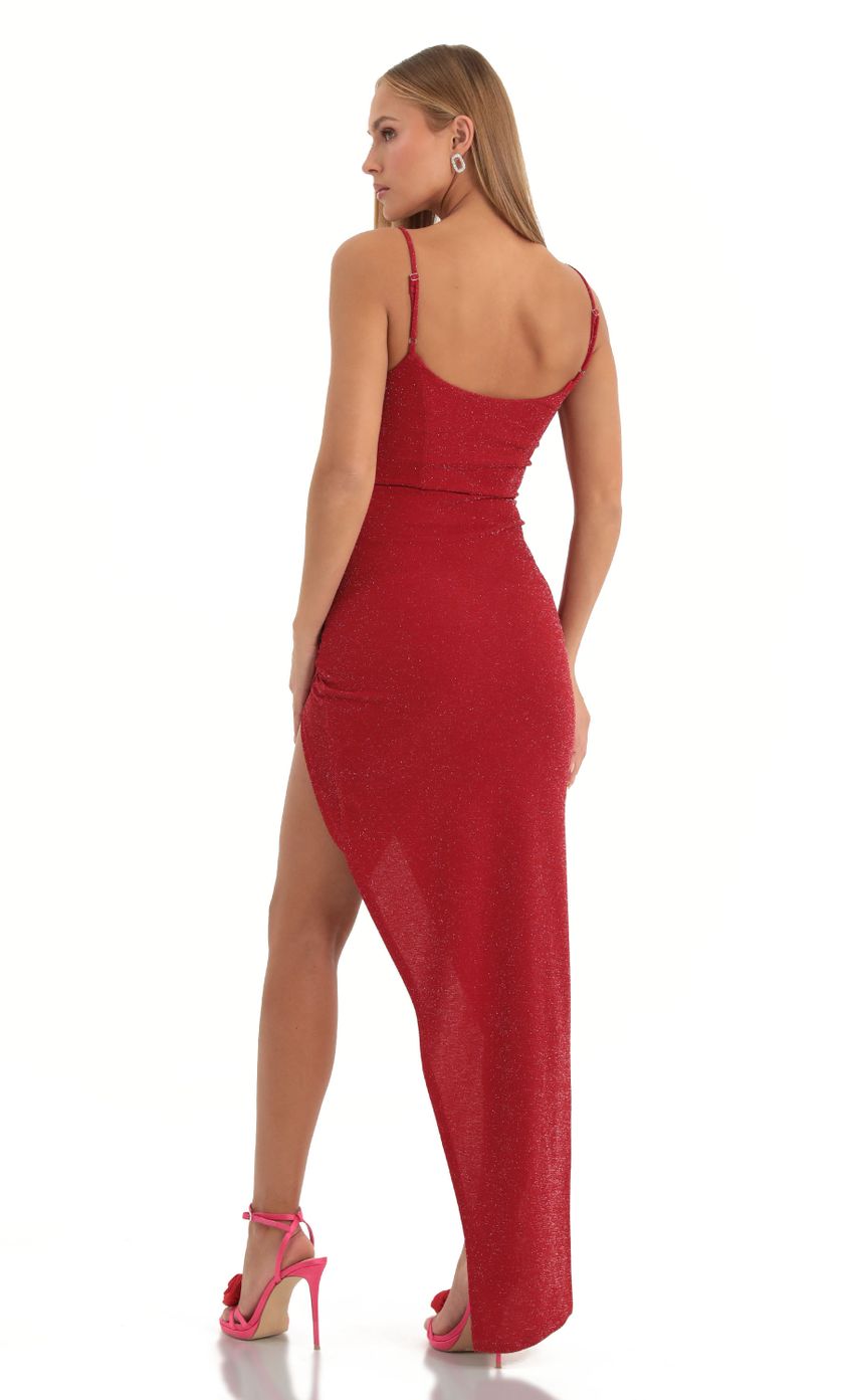 Picture Cyrus Metallic Knit Maxi Dress in Red. Source: https://media-img.lucyinthesky.com/data/Dec22/850xAUTO/b62bb9c1-1622-4516-9518-76ea82fcd324.jpg