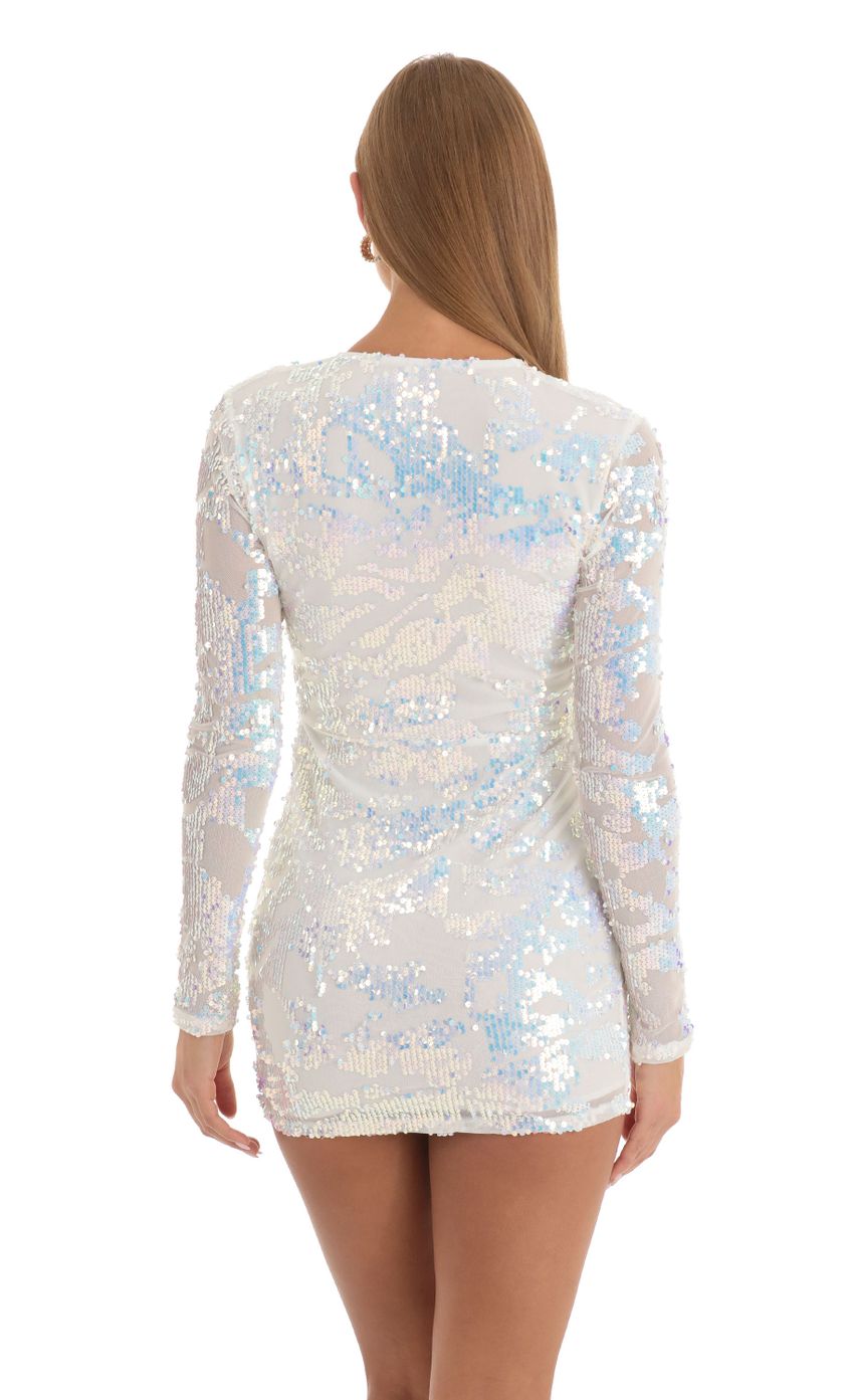 Picture Paris Mesh Iridescent Sequin Plunge Dress in White. Source: https://media-img.lucyinthesky.com/data/Dec22/850xAUTO/b8b9d994-27cf-4f07-a5fb-c82a586f2fa3.jpg