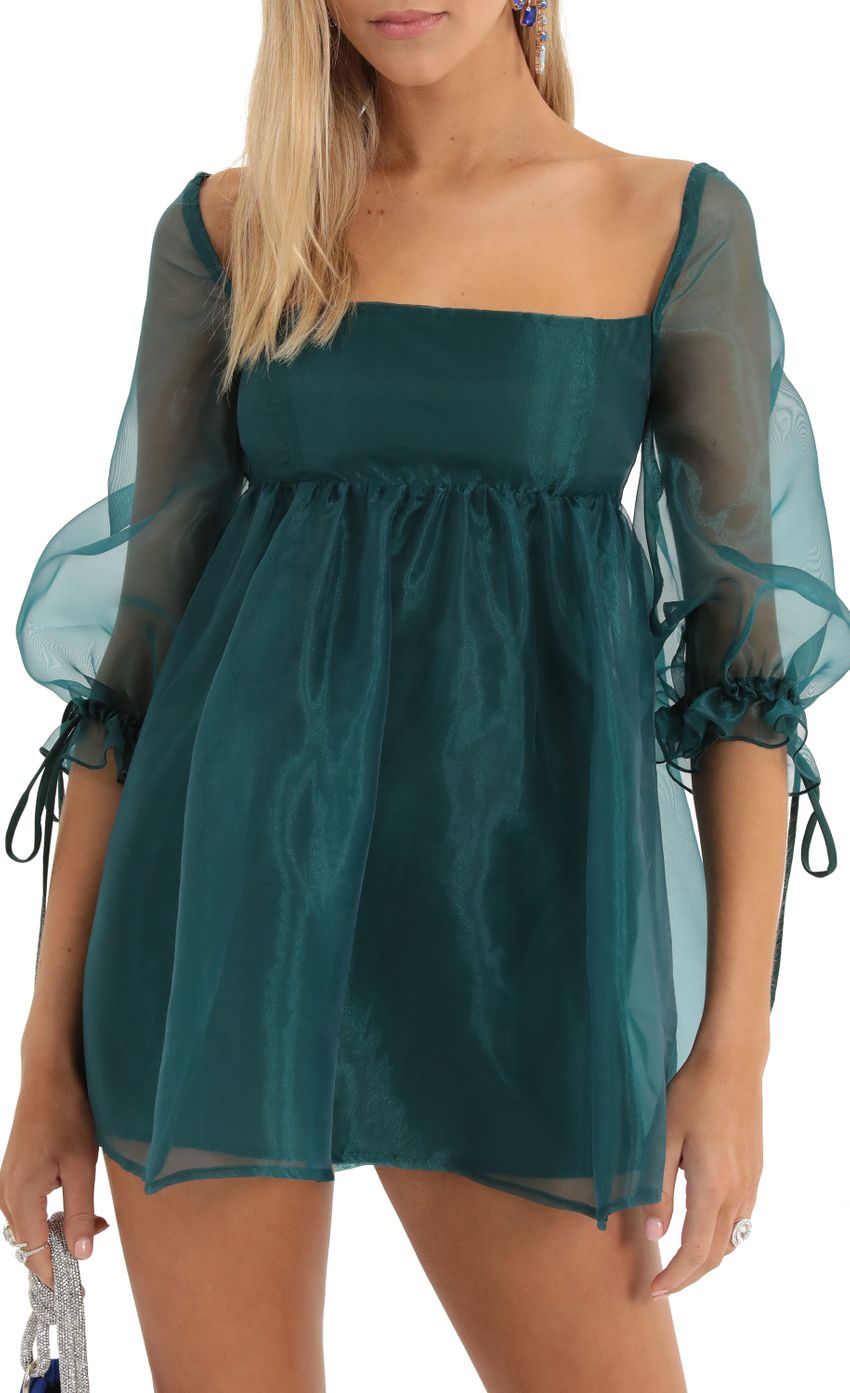Picture Puff Sleeve Baby Doll Dress in Green. Source: https://media-img.lucyinthesky.com/data/Dec22/850xAUTO/c142e1a6-3706-4553-bc63-21e7652427b4.jpg